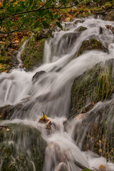 A few days of heavy rain in the English Lake District led to streams of water running off the autumnal colored fells