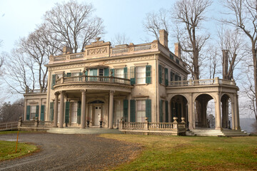 Fototapeta na wymiar Annandale-on-Hudson, NY - USA - Dec. 28, 2021: Three quarter view of the Federal-style Montgomery Place, an early 19th-century estate that has been designated a National Historic Landmark.
