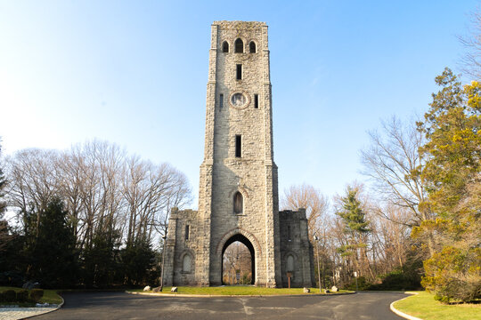Alpine, NJ - USA - Dec. 24, 2021: View of Rionda’s Tower and Historical Marker, formerlly  known as the Alpine Stone clock tower or the Devil's Tower. Erected in 1910 by sugar baron Manuel Rionda.