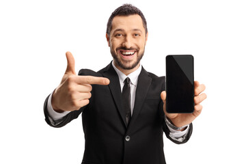 Businessman holding a smartphone and pointing at the screen