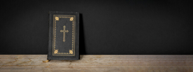 Church faith Christian background banner panorama - Old holy bible with golden cross on old rustic...
