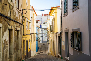 Fototapeta na wymiar Steep streets of downtown of Sesimbra, Lisbon Metropolitan area, Portugal