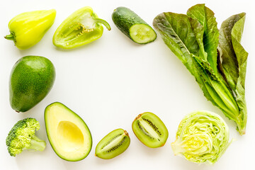 Frame of raw green vegetables and herbs for vegetarian protein diet