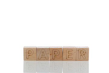 Wooden cubes with letters paper on a white background