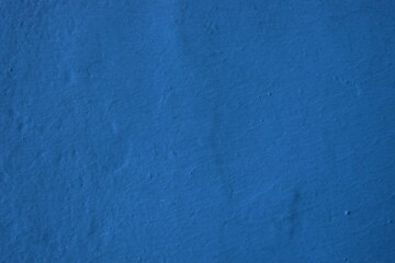 Fototapeta na wymiar An isolated blue painted wall