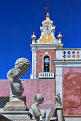 NeoRococo palace-pink facade-walltop busts-clock and bell tower-white balustrade-weather vane. Estoi-Algarve-Portugal-035