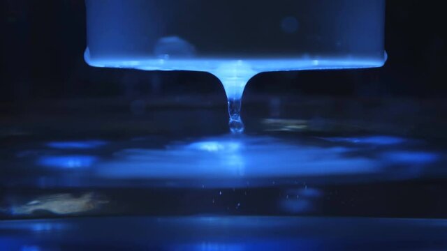 Close up footage of filtering water at home filter with cartridge equipment. Ultraviolet filtration