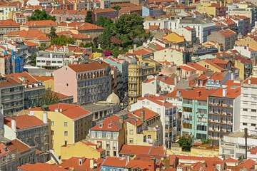 Fototapeta na wymiar Aerial view on typical apartment buildings in pastel colors of Lisbon, Portugal 