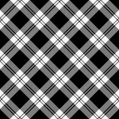 Diagonal tartan Christmas and new year plaid. Scottish pattern in red and black cage. Scottish cage. Traditional Scottish checkered background. Seamless fabric texture. Vector illustration