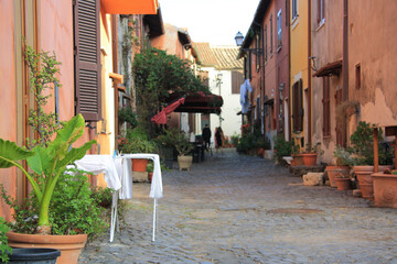 Alleys and Roman houses in the old town of Ostia Antica, Rome, Italy. Ancient Small Medieval Town...