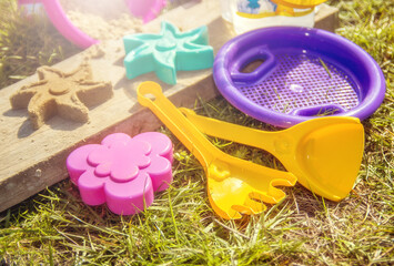 Multi-colored plastic toys for children to play in the sand on the beach and in the sandbox.