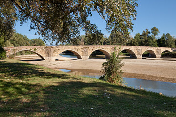 Arezzo, Tuscany, Italy: the medieval Buriano bridge over the Arno river in the regional nature park. It seems that this is the landscape painted by Leonardo da Vinci behind Mona Lisa