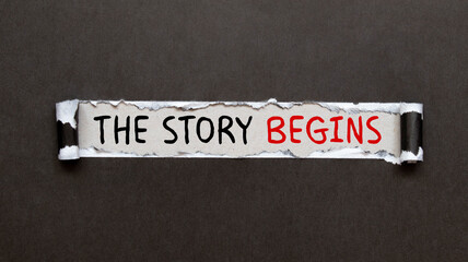text THE STORY BEGINS appearing behind torn paper.