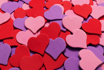 Hearts of different colors are arranged in random order.