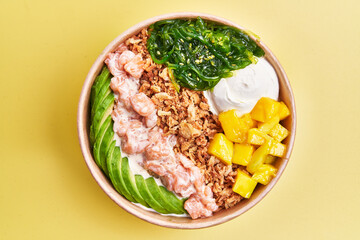  Single poke bowl over yellow background