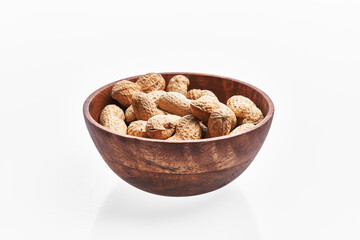  Bowl of peanuts with shell isolated on a white background