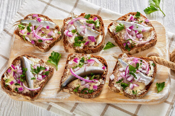 pickled sprat rye bread open sandwiches, top view
