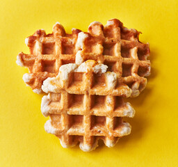  Bunch of delicious waffles over yellow background
