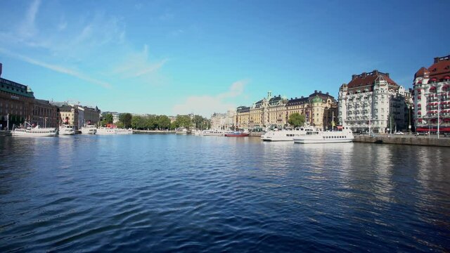 Stockholm Strandv&auml;gen in Ostermalm with ferries and sailing ships