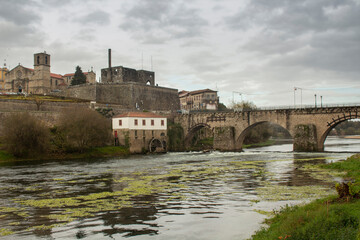 Medieval bridge in the C&aacute;vado river in the city of Barcelos
Barcelos in the North of Portugal