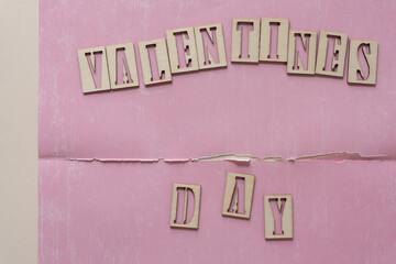 valentines day on torn pink paper