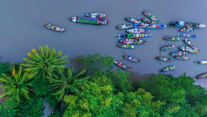 Phong Dien Floating Market in Can Tho is very crowded and bustling on the occasion of Tet Holiday.