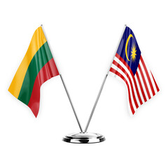 Two table flags isolated on white background 3d illustration, lithuania and malaysia