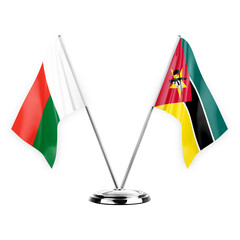 Two table flags isolated on white background 3d illustration, madagascar and mozambique