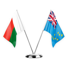 Two table flags isolated on white background 3d illustration, madagascar and tuvalu