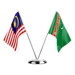 Two table flags isolated on white background 3d illustration, malaysia and turkmenistan