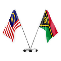 Two table flags isolated on white background 3d illustration, malaysia and vanuatu