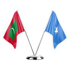 Two table flags isolated on white background 3d illustration, maldives and somalia