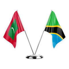 Two table flags isolated on white background 3d illustration, maldives and tanzania - obrazy, fototapety, plakaty