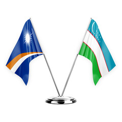 Two table flags isolated on white background 3d illustration, marshall islands and uzbekistan