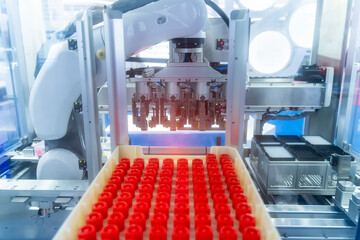 Robot arm with test tube for biological experiments in laboratory