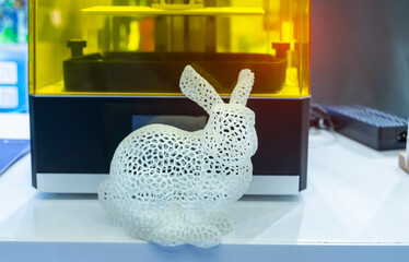 rabbit closeup object printed 3d printer close-up. Progressive modern additive technology 4.0...