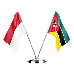Two table flags isolated on white background 3d illustration, monaco and mozambique