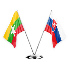 Two table flags isolated on white background 3d illustration, myanmar and slovakia