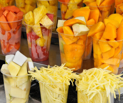 Plastic Cups Of Fresh Tropical Fruit For Sale By Street Vendor In Salento, Quindio, Colombia