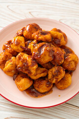 fried meatballs with spicy dipping sauce