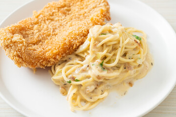 spaghetti pasta white cream sauce with fried fish
