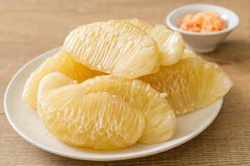 Fresh peeled pomelo, grapefruit or shaddock