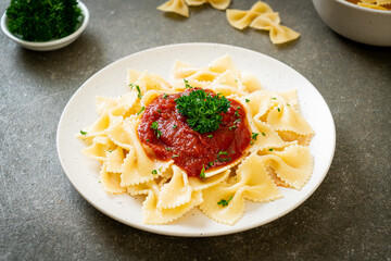 farfalle pasta in tomato sauce with parsley