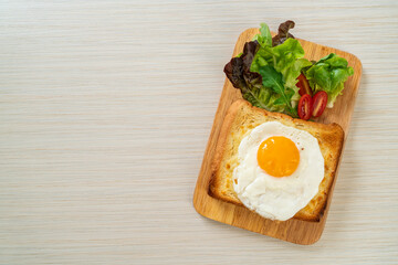 bread toasted with cheese and fried egg