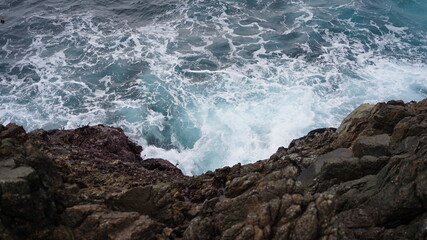 Waves crashing on the rocks
