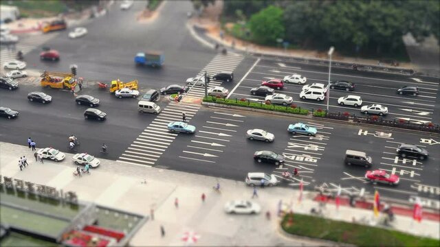 Cars are Moving on Chinese City Crossroad

EOS Canon 7D, Canon 45mm Tilt-Shift Lens, MS, Dolly, Locked Down
1/50; f2,8; ISO 100