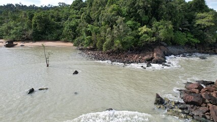 The Telok Teluk Melano Coastline and Serabang Beach at the most southern tip of the Tanjung Datu part of Sarawak and Borneo Island