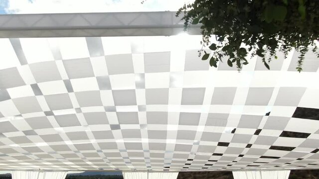 Detail of a custom ceiling set up for a social event.