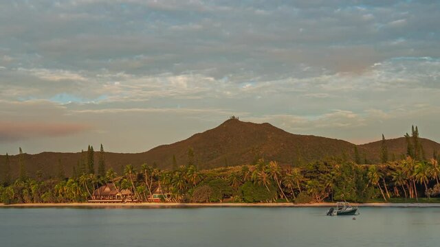 Kou Bugny Hotel on Kuto Beach, Isle of Pines during vibrant sunset. Timelapse.