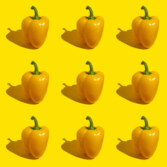 Seamless pattern with bell pepper on yellow background.